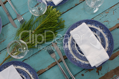 Table setting on weathered wooden plank