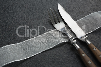 Fork and butter knife with a cloth