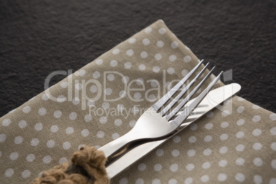 Fork and knife on a dotted napkin