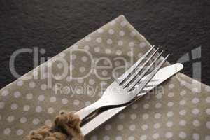 Fork and knife on a dotted napkin