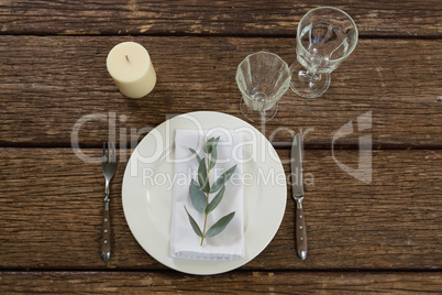 Elegance table setting on wooden plank