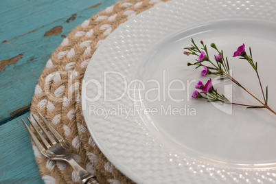 Table setting on weathered wooden plank