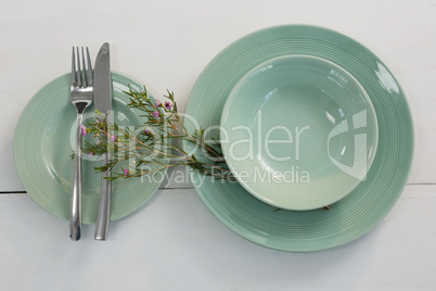 Elegance table setting on wooden plank