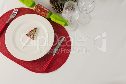 Plate and cutlery set beautifully on Christmas theme