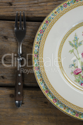 Elegance table setting on wooden plank