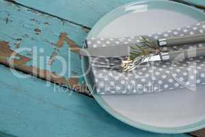 Table setting on weathered wooden plank