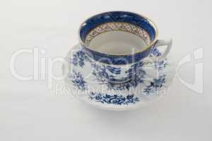 Empty cup with saucer
