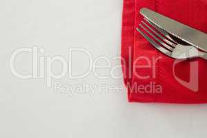 Fork and butter knife with napkin