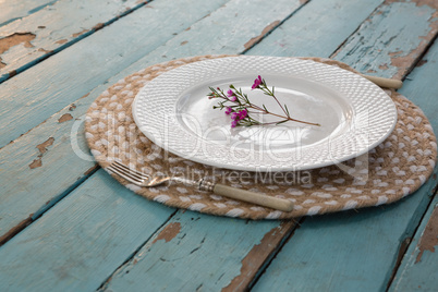 Table setting on weathered wooden plank