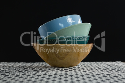 Stack of bowl on table cloth