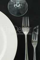 Dining plates set on black theme table