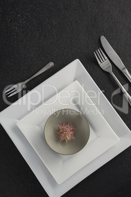 Elegant table setting with floral arrangement