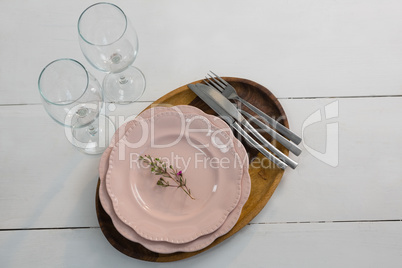 Elegance table setting on wooden plank Elegance table setting on wooden plank
