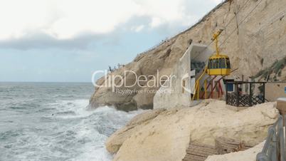 Rosh Hanikra view with sea, rocks and moving cable car