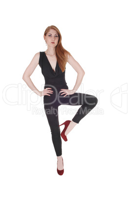 Woman standing on one leg