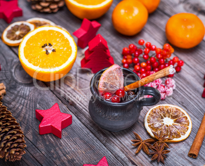 Mulled wine in a brown ceramic cup