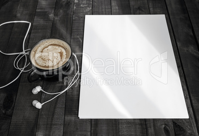 Letterhead, coffee cup, headphones