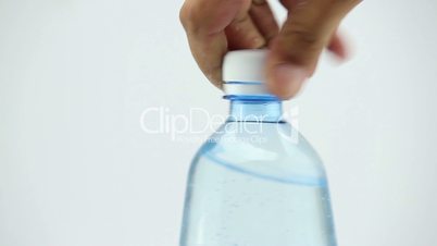 bottle water open hand white background
