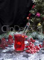 red viburnum tea in a glass