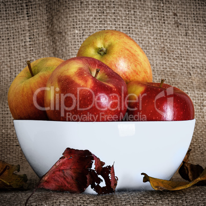 Apples on fruit plate with background