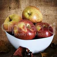Apples on fruit plate with background