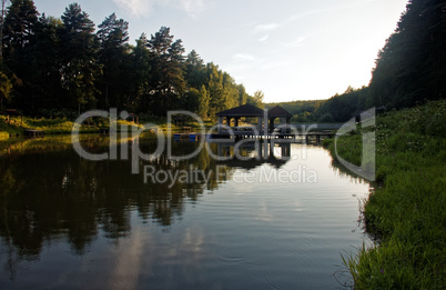 the pond on a summer evening in the countryside