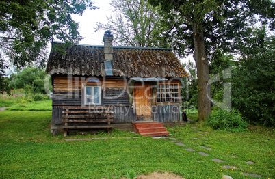 rural wooden house in the summer in Russia