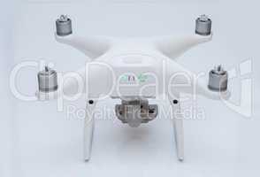 Drone, white studio background shooting, quadrocopter fpv fly camera rc controller