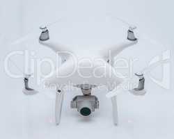 Drone, white studio background shooting, quadrocopter fpv fly camera rc controller