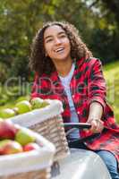 Mixed Race Female Teenager Driving Tractor Picking Apples