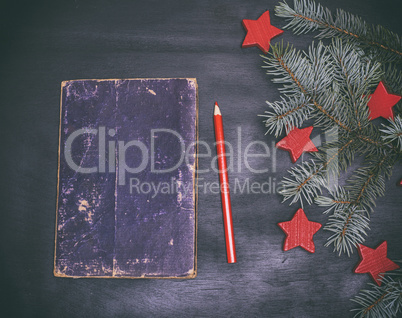 old notebook and red pencil