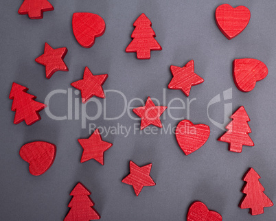 black background with red wooden figures