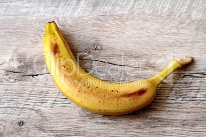 Banana on a wooden table.