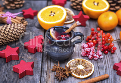 mulled wine in a brown ceramic mug