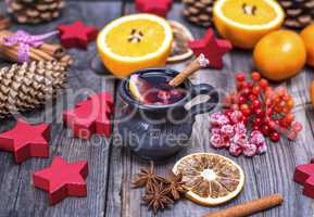 mulled wine in a brown ceramic mug