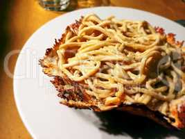 typical roman pasta with cacio e pepe (cheese and pepper) sauce