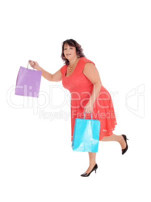 Overweight woman running with bag's