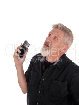 Middle age man frustrated with his phone