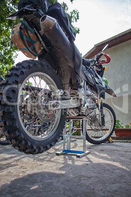 Enduro dirt bike high prepearing for the trip in the mountains