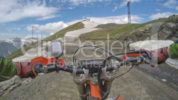 Enduro journey with dirt bike high in the mountains