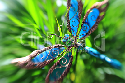 Artificial butterfly in a plant