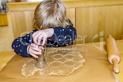 Child at the cookie baking