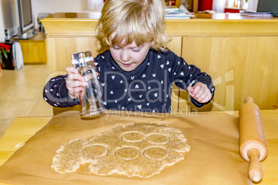 Child at the cookie baking