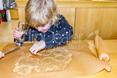 Child at the cookie baking