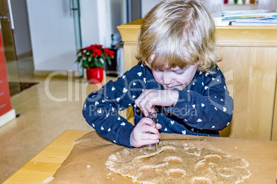 Child at the cookie baking