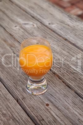 Fresh squeezed Orange juice in a clear glass