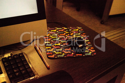 Computer mouse pad with colorful dachshund dogs