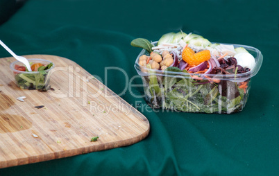 Healthy mixed green salad with beans and cheese