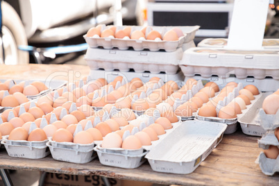 Egg Crates of brown and white eggs at a local farmers market
