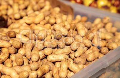 Crate of organic peanuts still in a shell